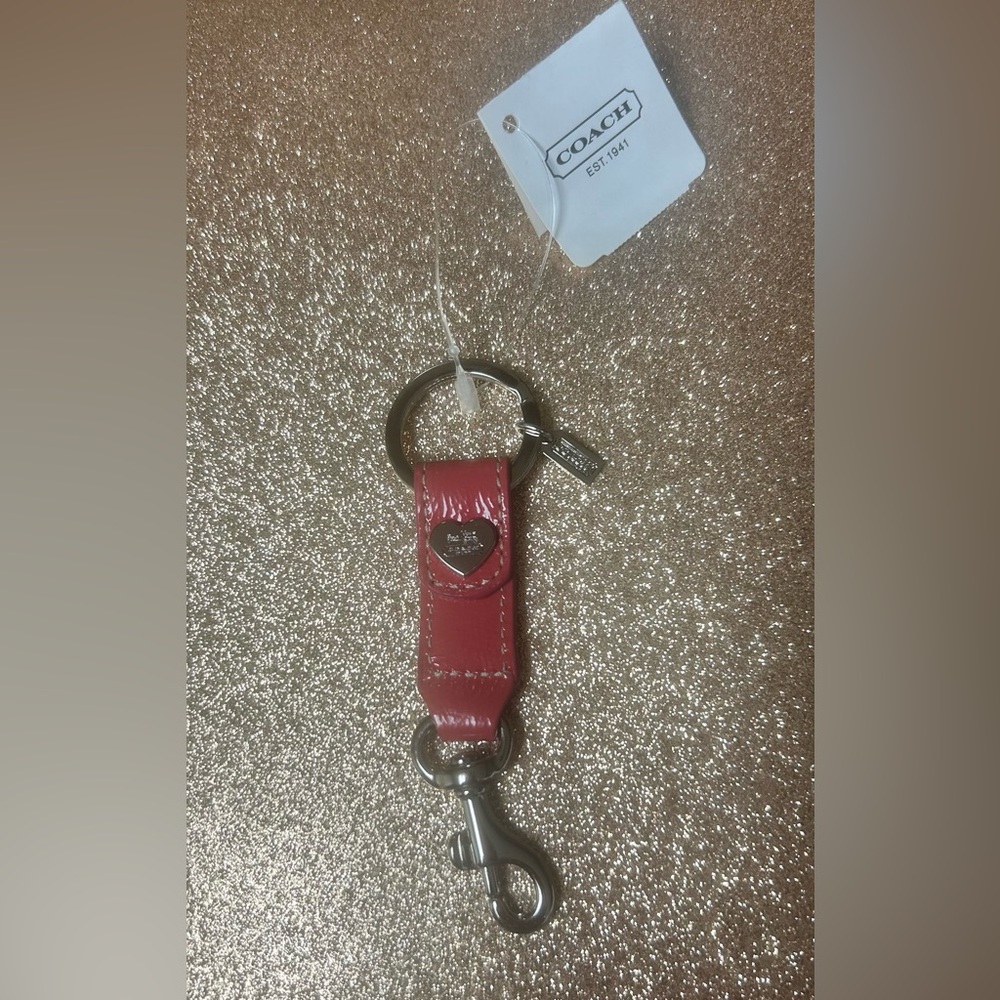 Coach Salmon-Colored Patent Leather Key Clip with Heart Charm